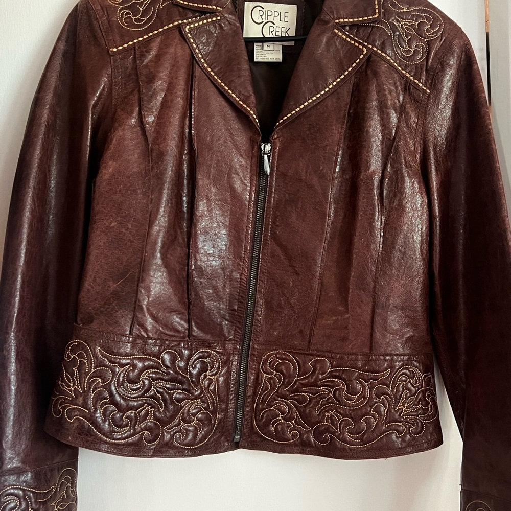 Rich Brown Leather Jacket with Embossed Floral Design
